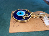 Glass evil eye pendant
